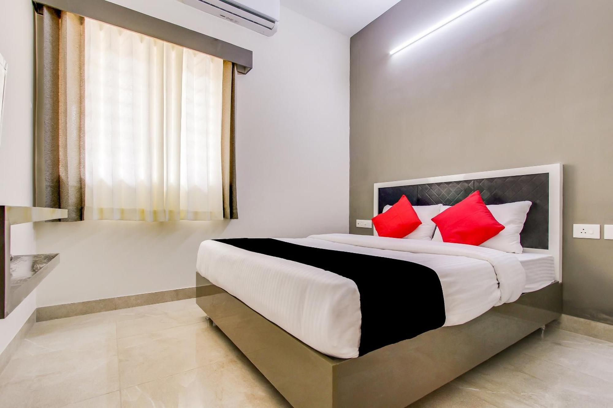 Capital O New Paradise Inn Irugur Exterior photo